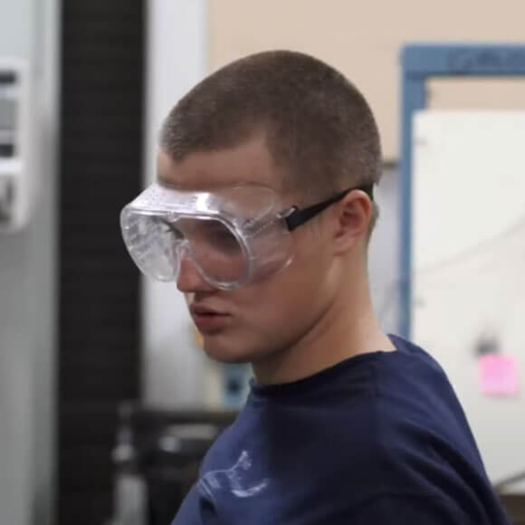 Cadet in class with protective eyewear